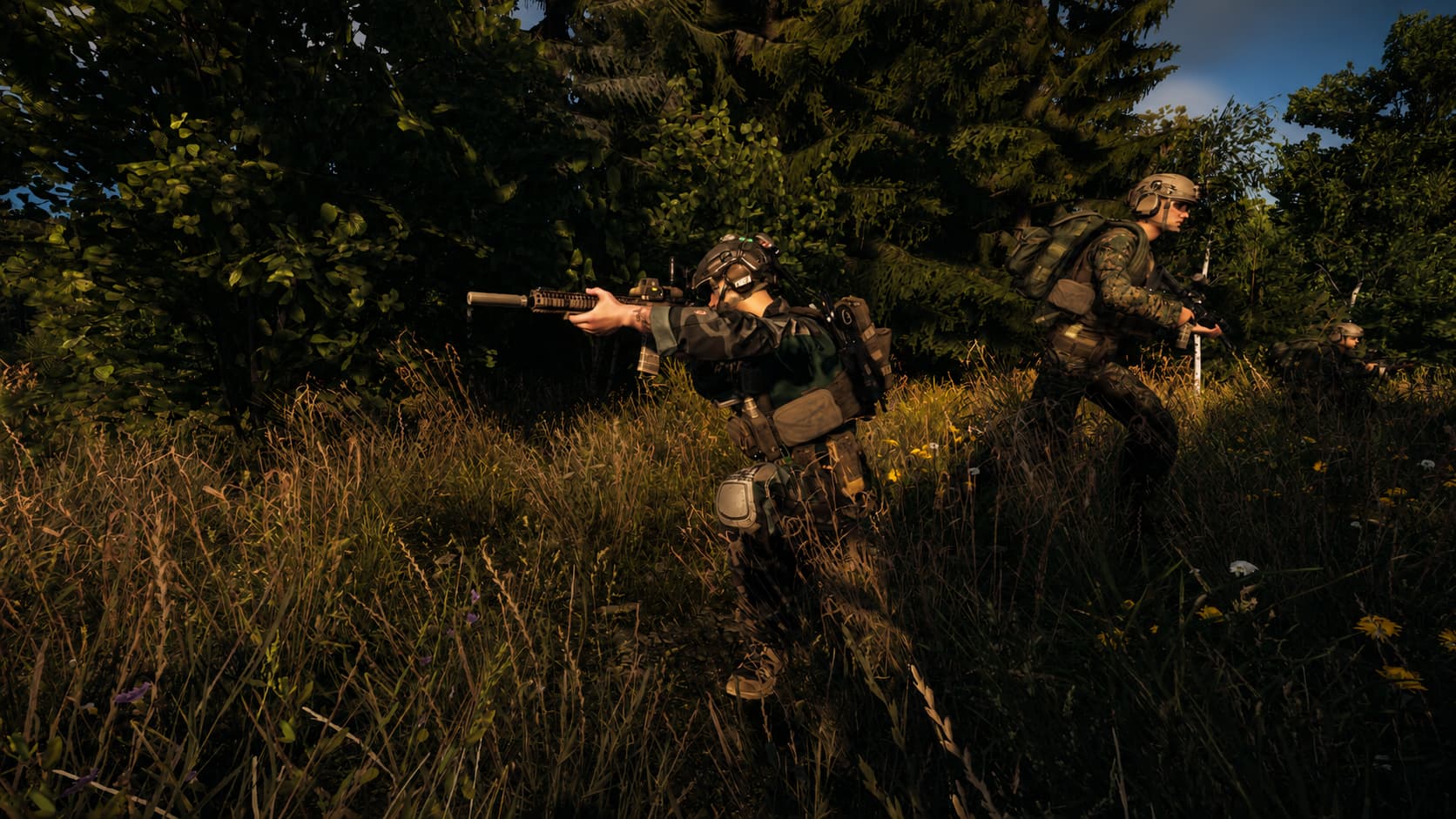 Team members moving through woodland